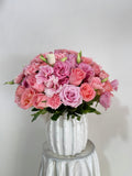 Arreglo floral de lisianthus y rosas en tonos pastel